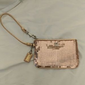 Coach Rose gold sequin wristlet EUC